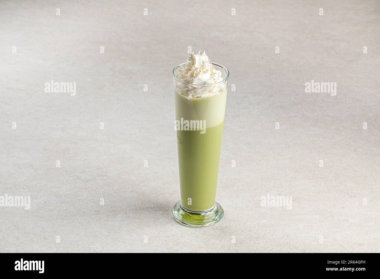 Portion of pistachio frapuccino with whipped cream Stock Photo