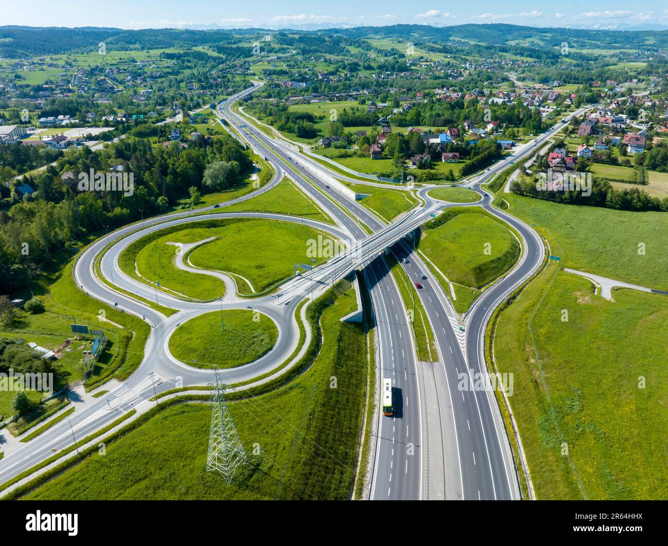 New motorway junction in Poland on national road no 7, E77, called Zakopianka.  Overpass crossroad with traffic circles, slip ramps and viaducts near Stock Photo