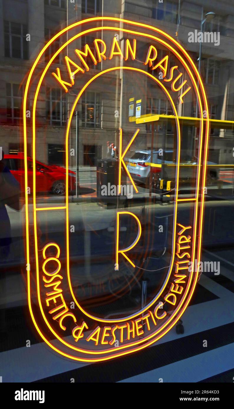 Private dentists - KR Kamran Rasul - Dentistry, 8 Chapel St, Liverpool L3 9AG - yellow neon sign - cosmetic & aesthetic treatments Stock Photo