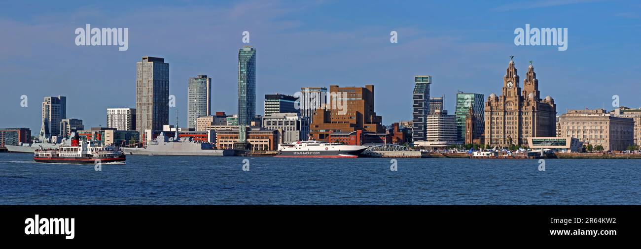 Royal Iris Mersey Ferry approaches Liverpool waterfront panorama from Woodside, Birkenhead, Wirral, Merseyside, England, UK, CH41 6DU Stock Photo