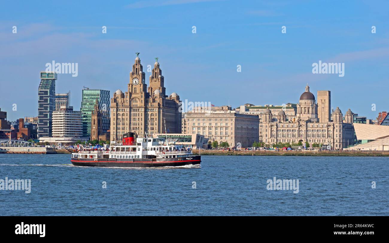 Royal Iris Mersey ferry, crosses the Liverpool waterfront panorama from Woodside, Birkenhead, Wirral, Merseyside, England, UK, CH41 6DU Stock Photo