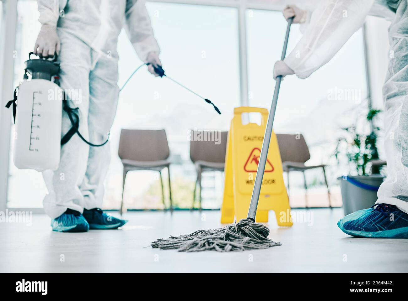 Covid disinfection, cleaning hospital floor with mop and healthcare