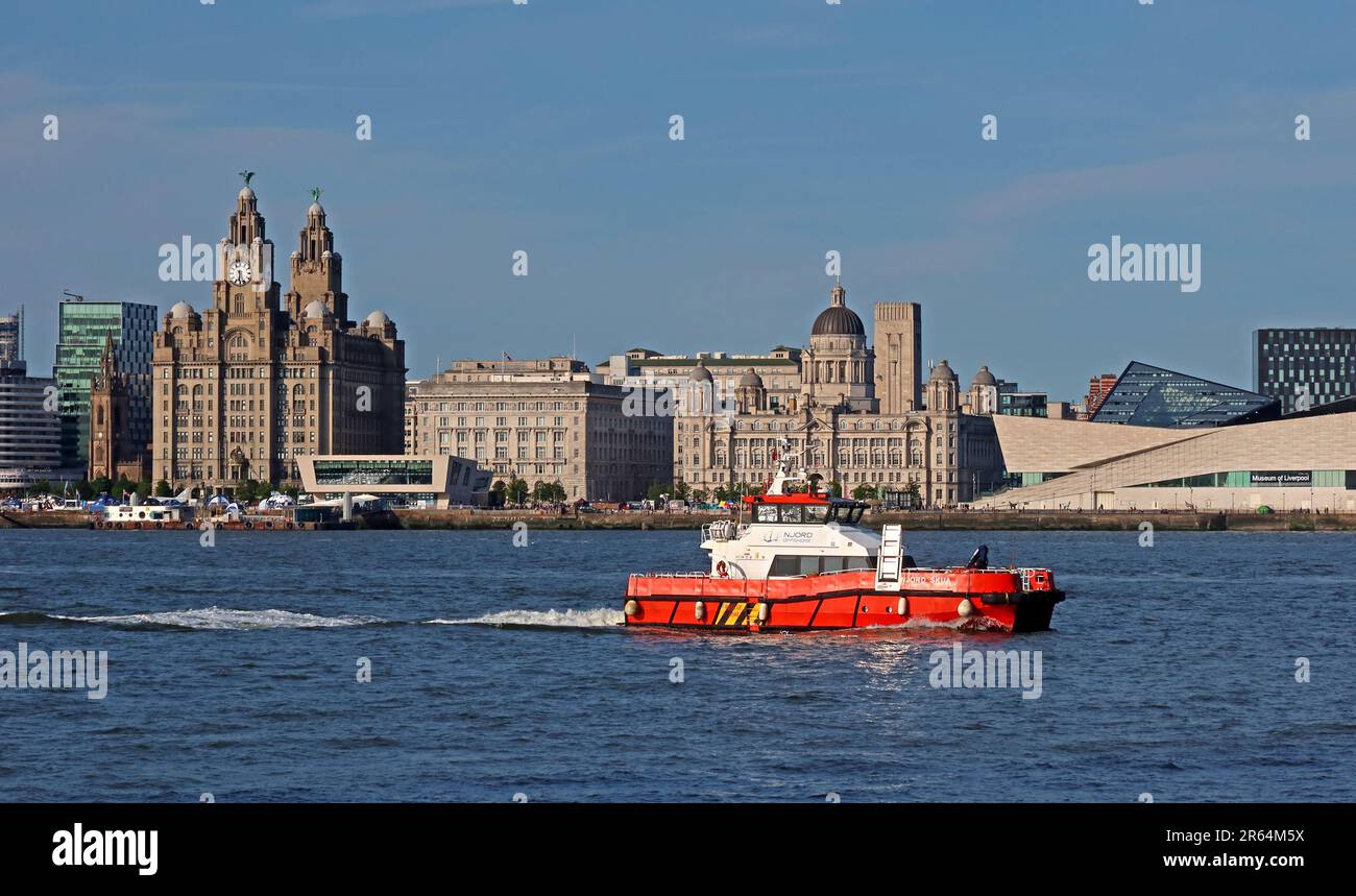 NJORD SKUA 2014 passes Liverpool waterfront from Woodside, Birkenhead, Wirral, Merseyside, England, UK, CH41 6DU Stock Photo