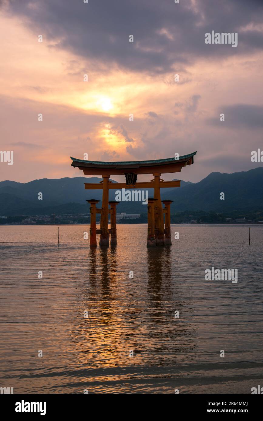 Sunset and Itsukushima Shrine Otorii Gate Stock Photo - Alamy