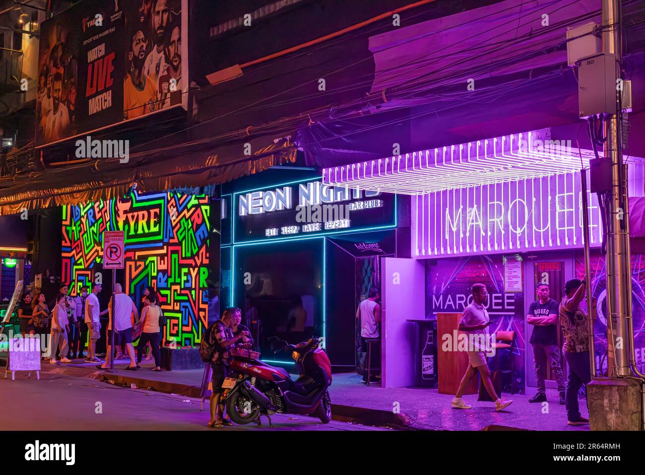 Bars and neon lights on P.Burgos street, Makati, Manila, Philippines Stock Photo