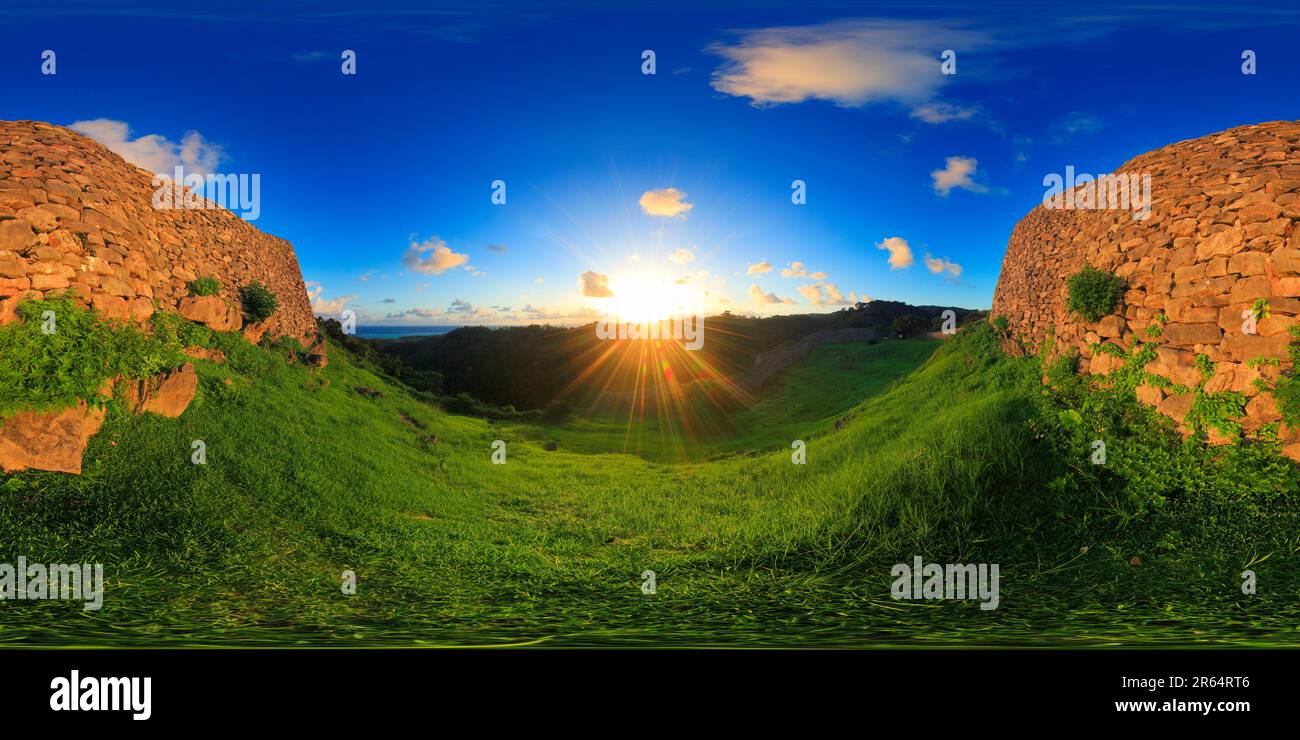 Castle wall of Nakijin Castle Ruins and the morning sun Stock Photo