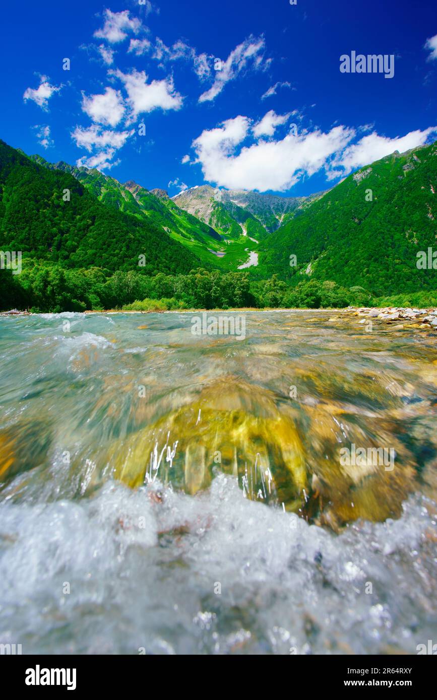 Clear stream of Azusa River and Hotaka mountain peaks Stock Photo Alamy