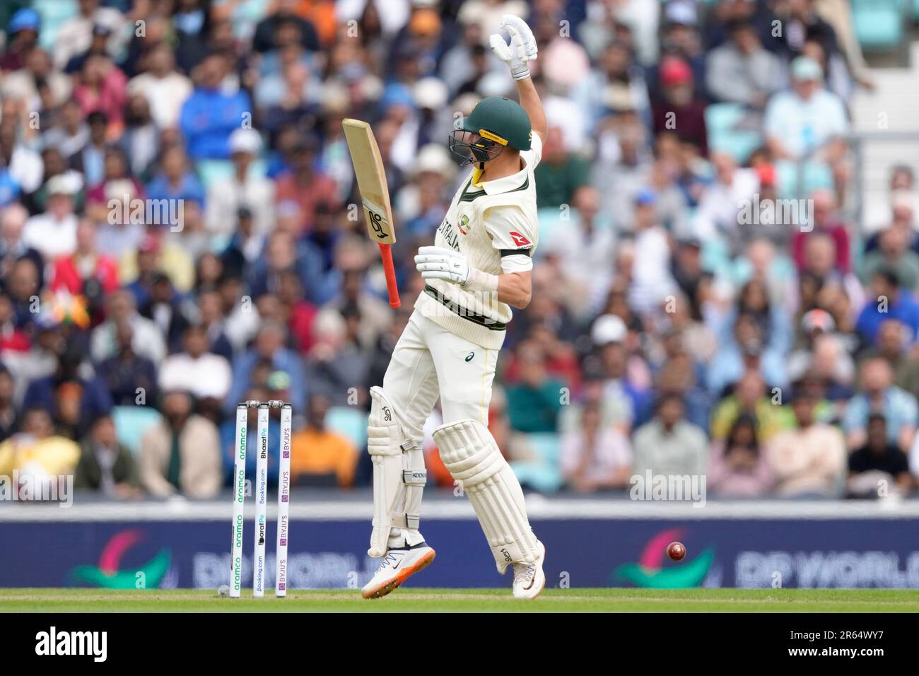 Australia's Marnus Labuschagne is hit on the hand and lets go of his