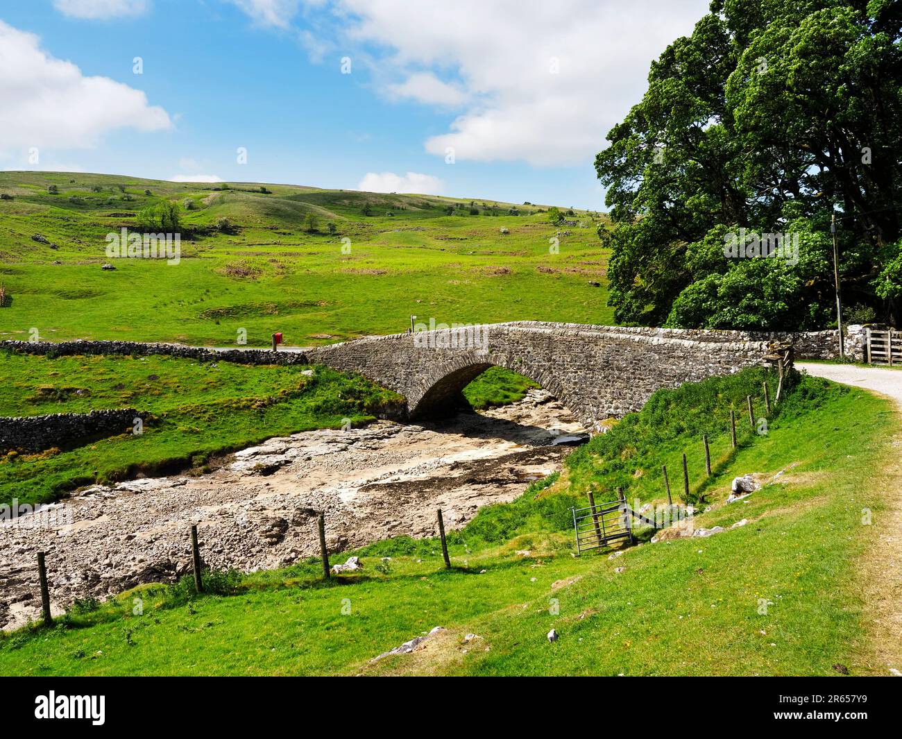 Yorckethwaite Bridge over a dry River Wharfe in Langstrothdale Upper Wharfedale Yorkshire Dales National Park North Yorkshire England Stock Photo