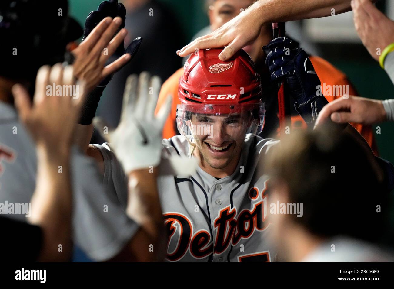 Detroit Tigers Zack Short wears a Red Wings hockey helmet as celebrates in  the dugout after hitting a three-run home run against the Kansas City  Royals, Wednesday, May 24, 2023, in Kansas