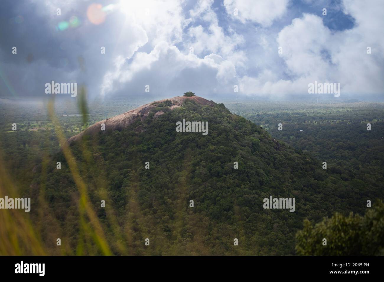 This image showcases a picturesque view of a lush, green hilly terrain ...
