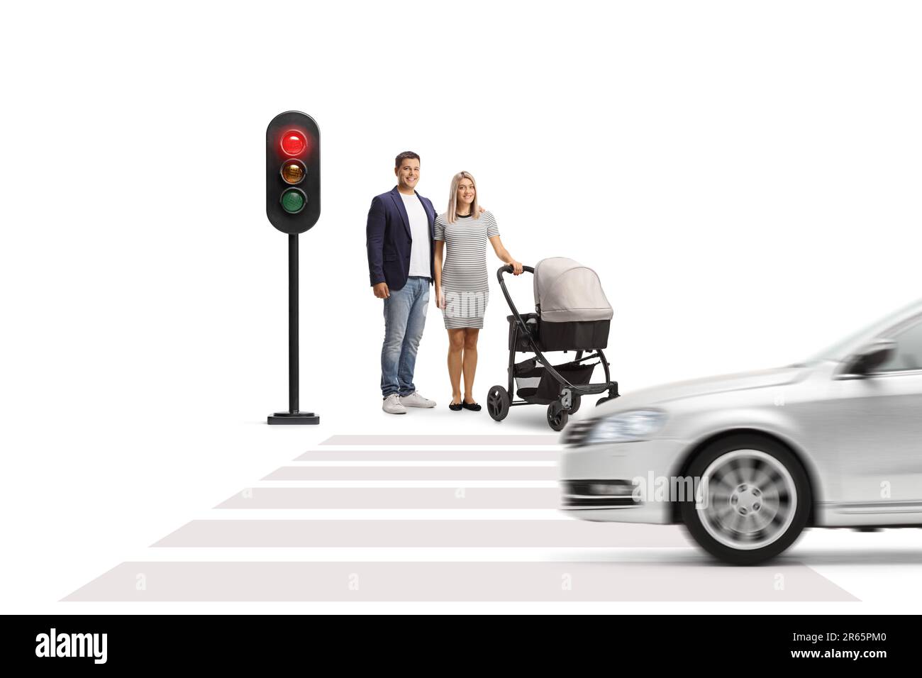 Couple with a baby stroller waiting at traffic lights isolated on white background Stock Photo