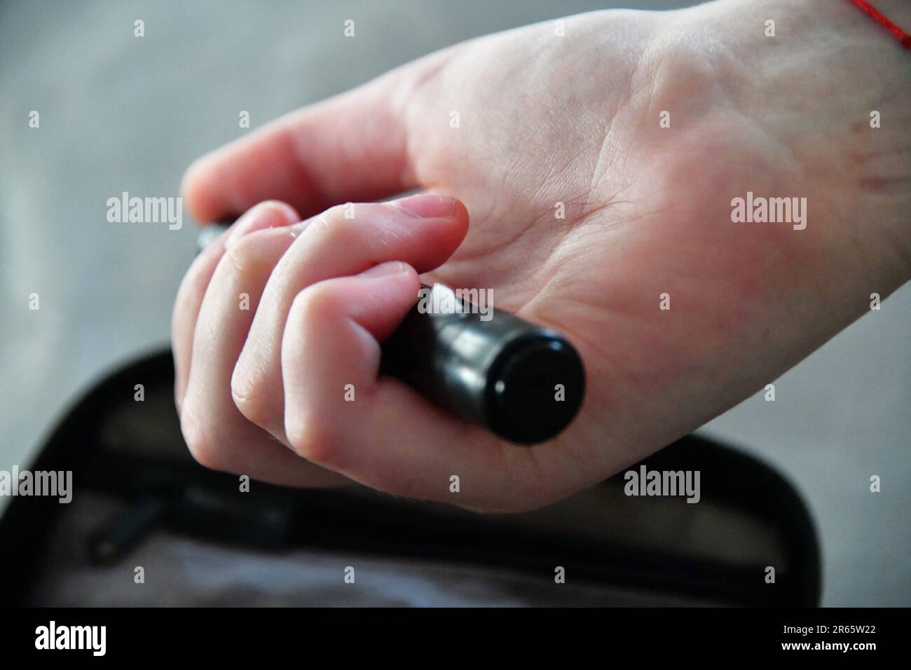 Peille, France. 03rd June, 2023. A young diabetic woman injects herself