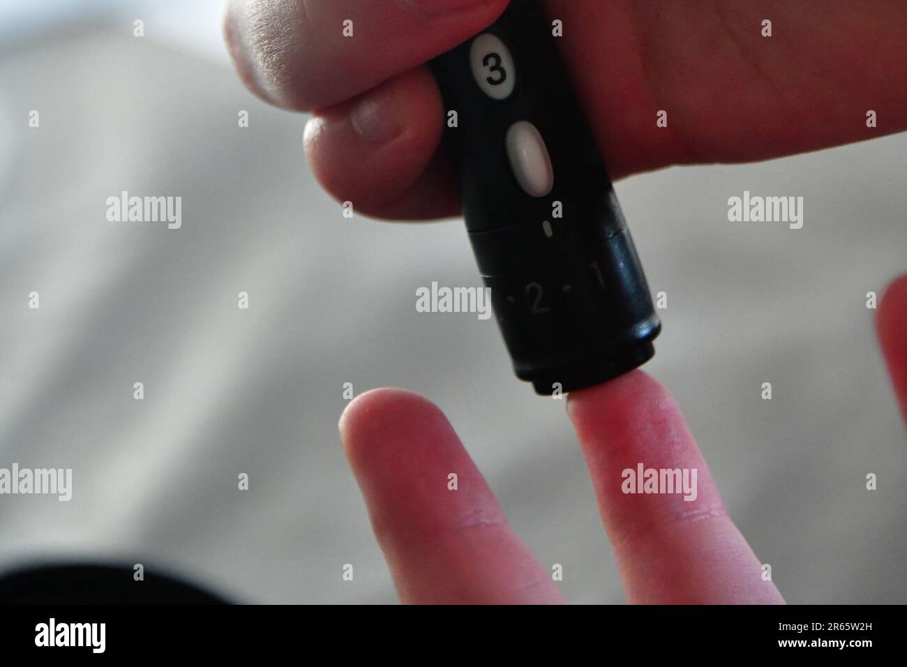 Peille, France. 03rd June, 2023. A young diabetic woman injects herself