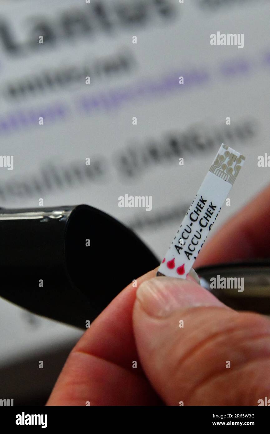 Peille, France. 03rd June, 2023. A young diabetic woman injects herself