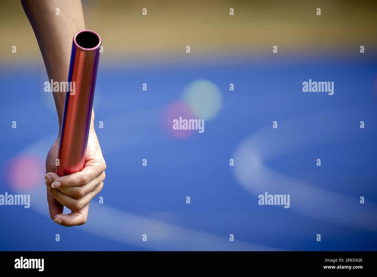 ARNHEM - A relay baton during a training of the 4x100 relay runners at Papendal. ANP ROBIN VAN LONKHUIJSEN Stock Photo