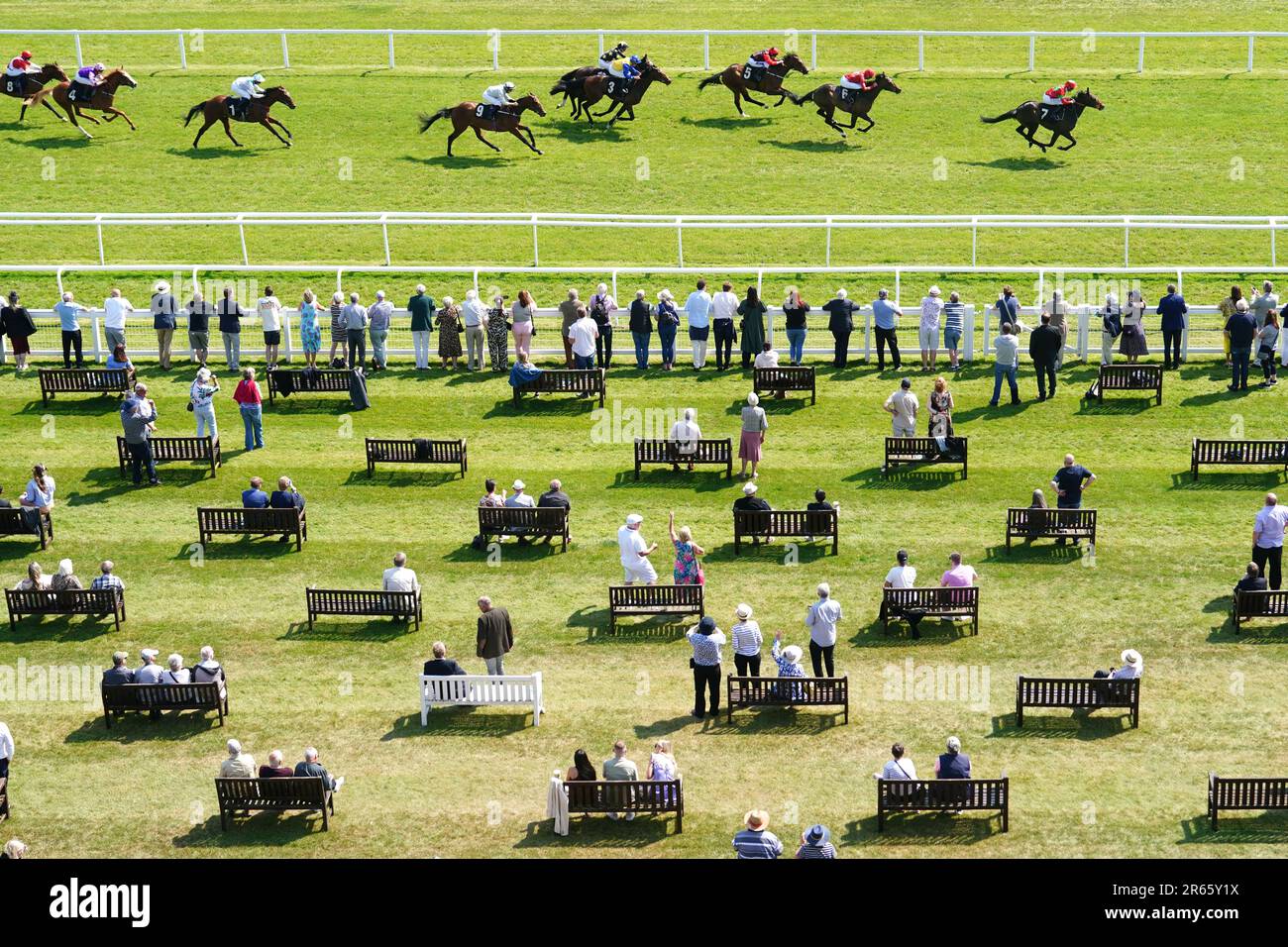 Son ridden by jockey Pat Dobbs (right) wins the Get a Run for Your Money at Betvictor Maiden Stakes as racegoers loook on during the BetVictor Early June Raceday at Newbury Racecourse. Picture date: Wednesday June 7, 2023. Stock Photo