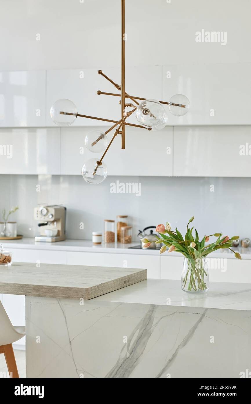 Vertical image of beautiful white kitchen with modern design Stock ...
