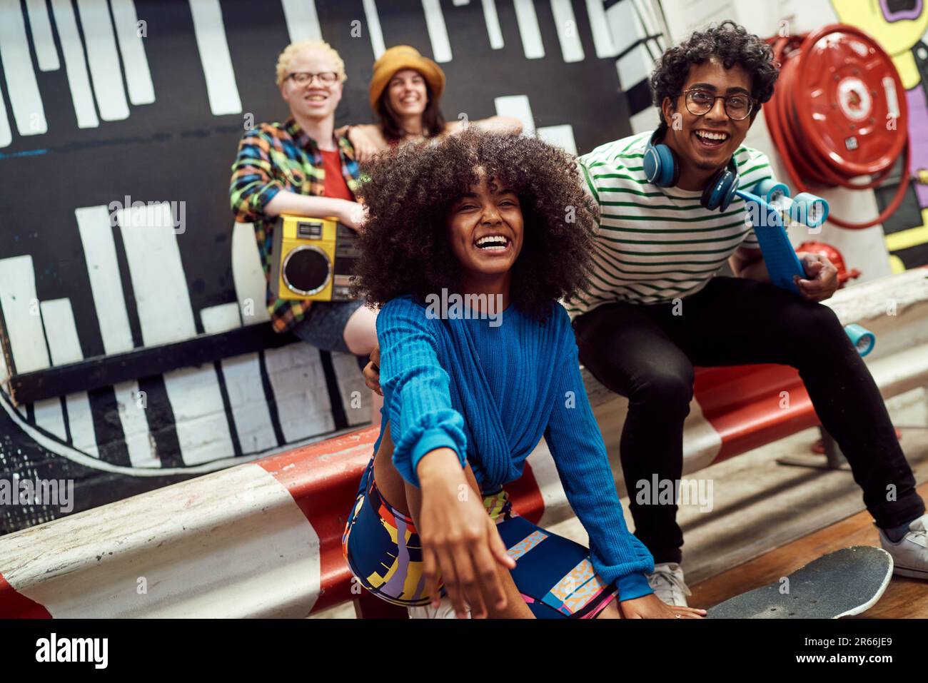 Portrait happy, carefree young friends laughing outdoors Stock Photo