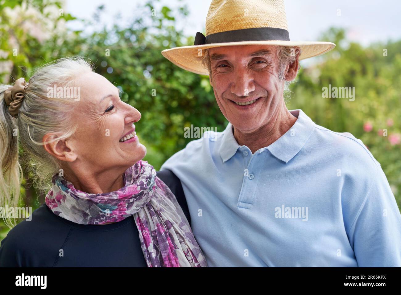 Portrait happy senior couple outdoors Stock Photo