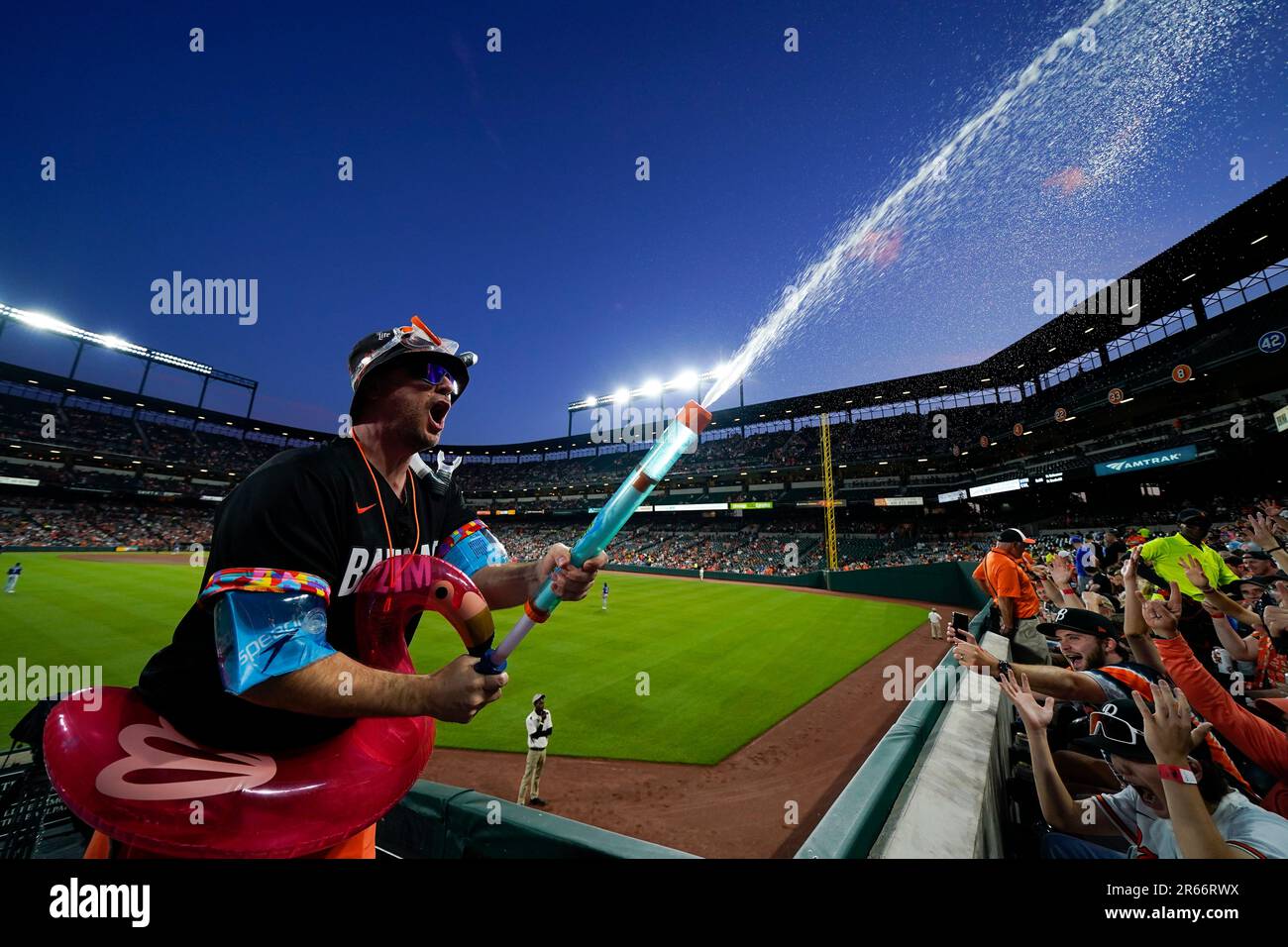 Mr. Splash sprays fans in the "Bird Bath Splash Zone" during the fifth