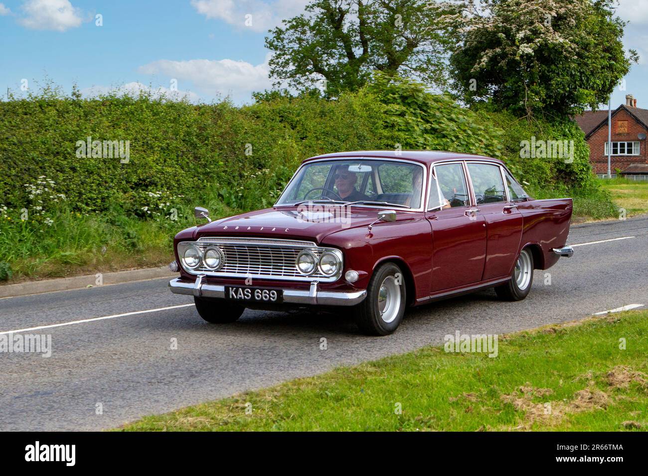 1962 60s sixties Ford Zodiac Maroon Car Petrol 2553 cc, four-door  sedan, travelling in Greater Manchester, UK Stock Photo