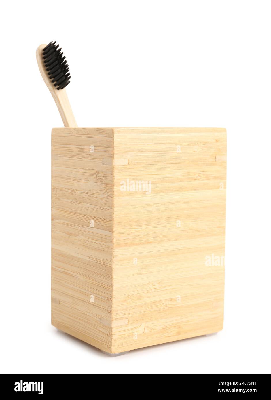 Bamboo tooth brush in holder on white background Stock Photo - Alamy