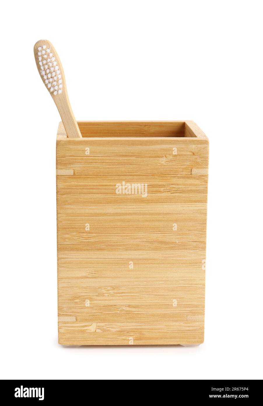 Bamboo tooth brush in holder on white background Stock Photo - Alamy