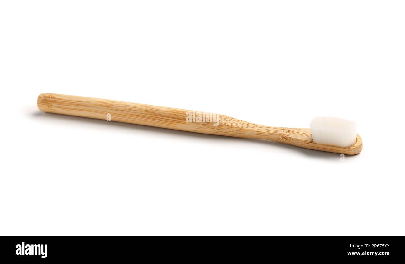 Bamboo tooth brush on white background Stock Photo - Alamy