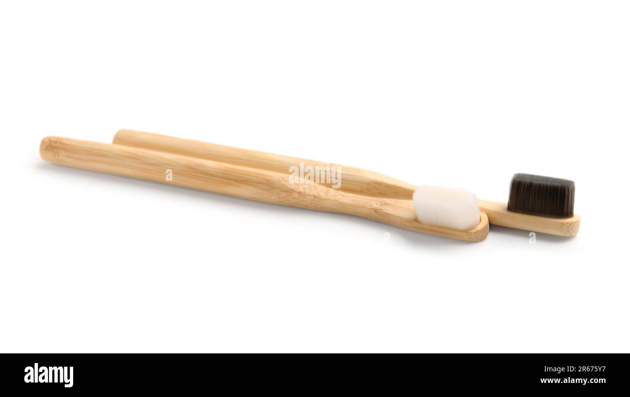 Bamboo tooth brushes on white background Stock Photo - Alamy