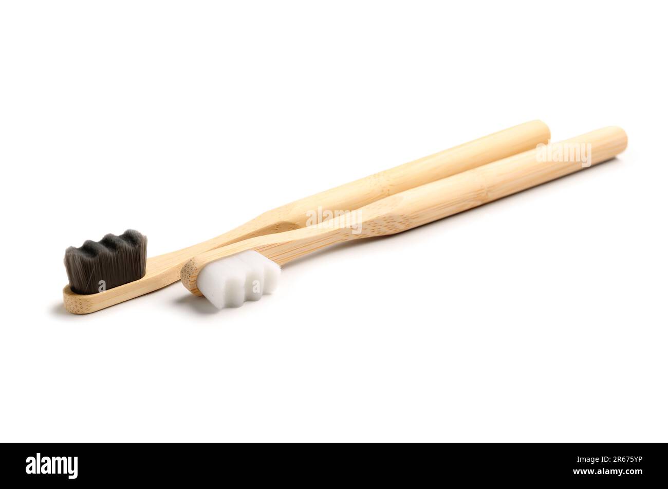 Bamboo tooth brushes on white background Stock Photo - Alamy