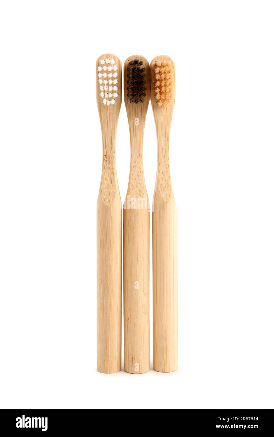 Bamboo tooth brushes on white background Stock Photo - Alamy