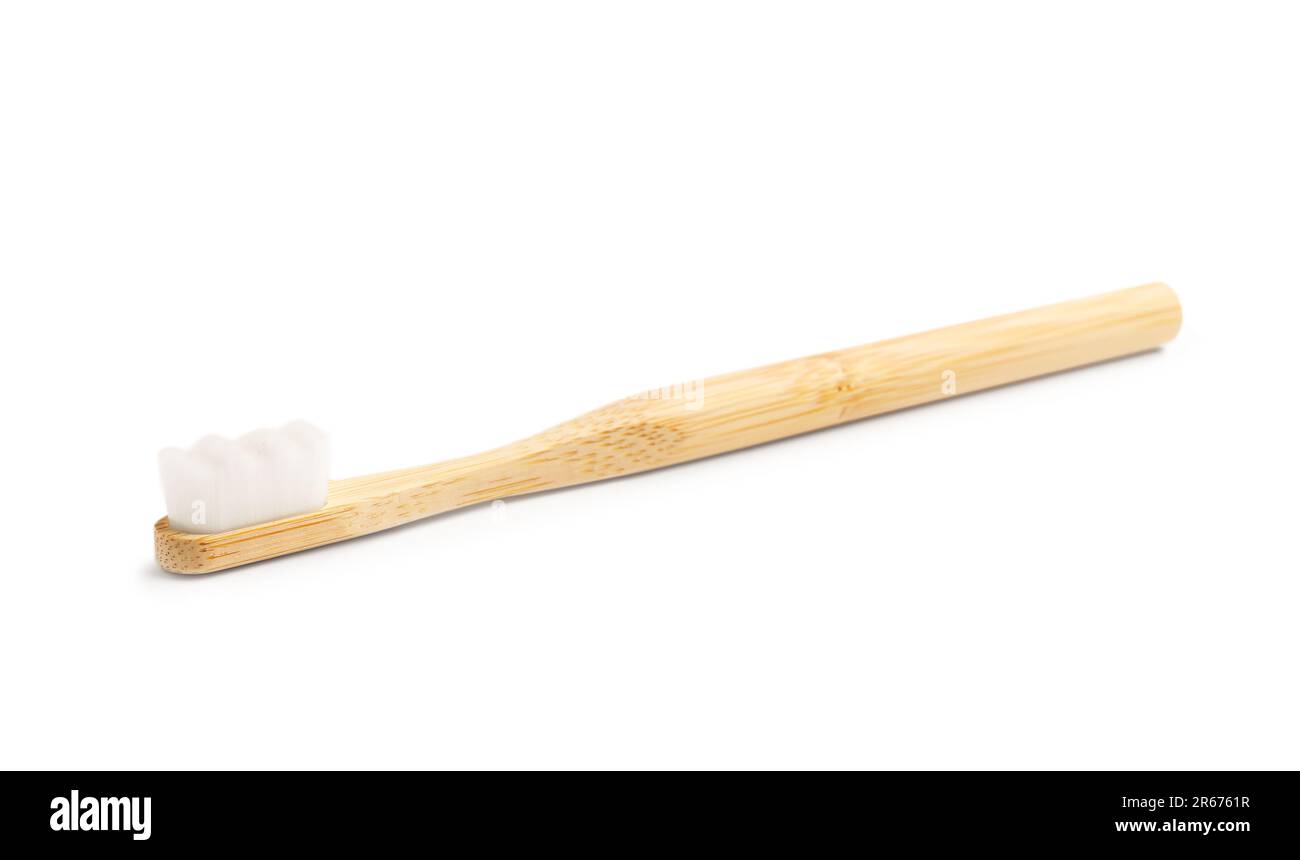Bamboo tooth brush on white background Stock Photo - Alamy