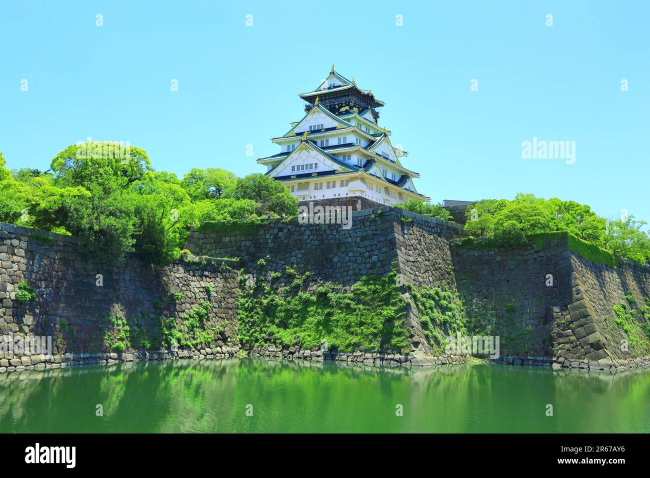 Osaka Castle tower and inner moat in fresh green Stock Photo - Alamy