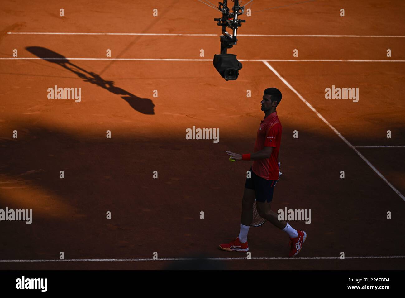 Paris, France - 07/06/2023, Novak Djokovic with a TV television spidercam  (Spider cam camera) during the French Open, Grand Slam tennis tournament on  June 6, 2023 at Roland Garros stadium in Paris,