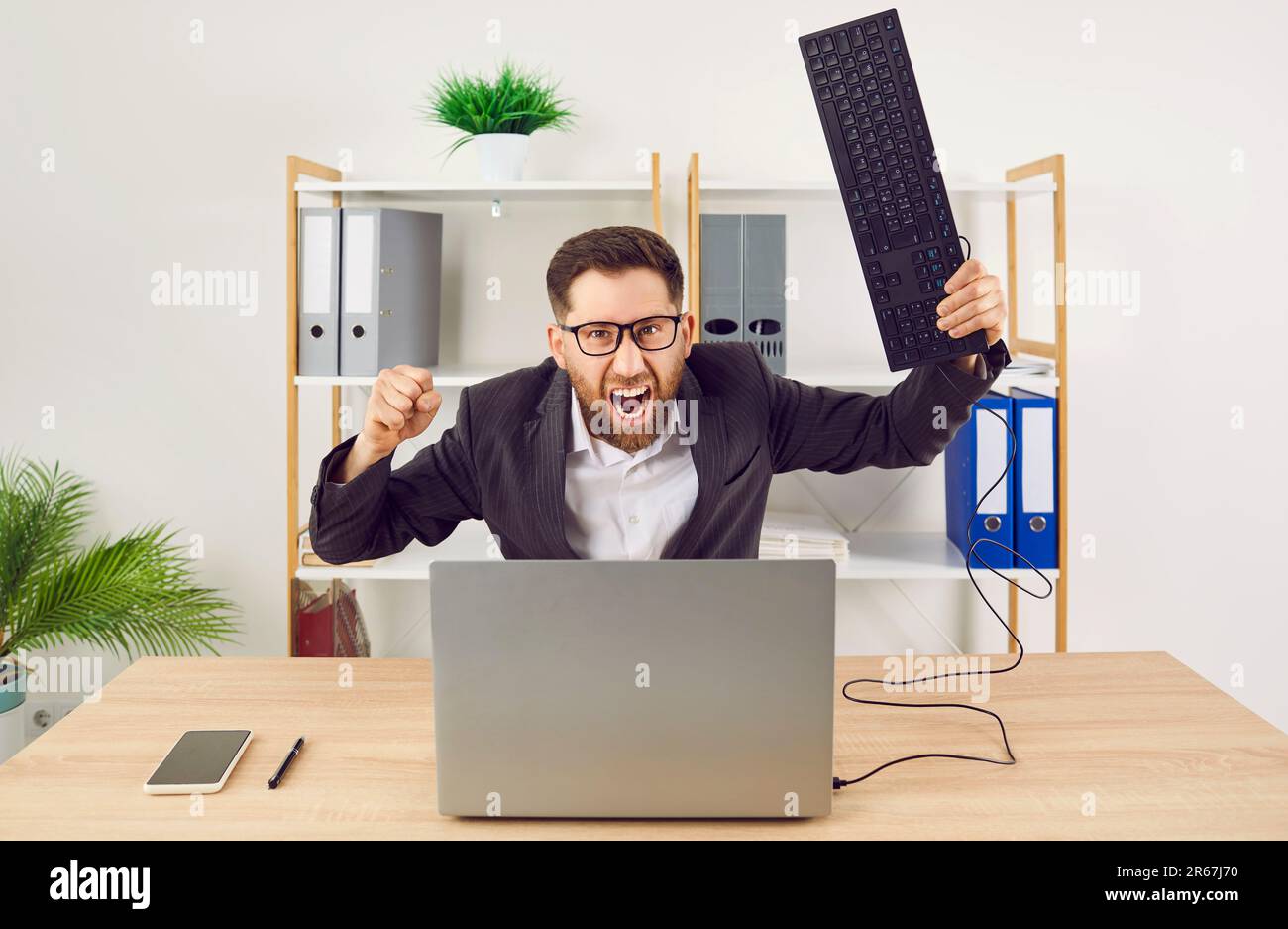 Computer man breaking hi-res stock photography and images - Alamy