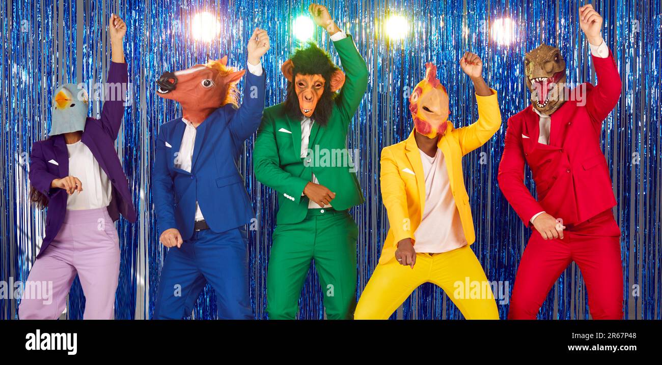 Group of people in colorful suits and funny animal masks dancing