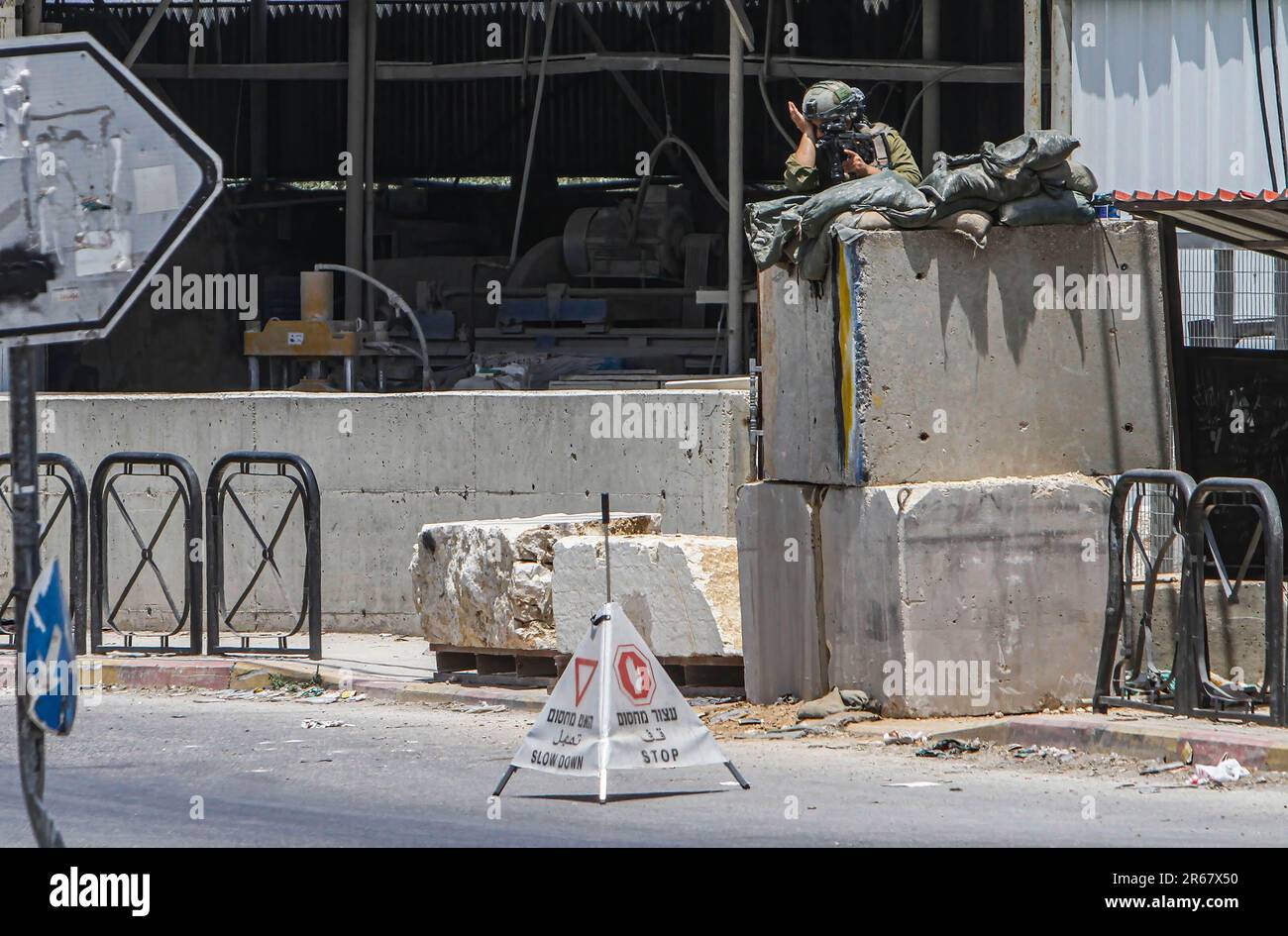 Nablus, Palestine. 07th June, 2023. An Israeli soldier seen guarding a ...