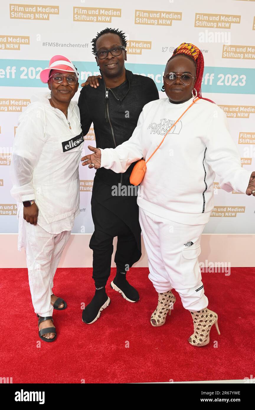 Cologne, Germany. 06th June, 2023. Shary Reeves (left) with her siblings Andrew and Terry, l-r, whose film 'The 4 Reeves and a Case of Death' can be seen on WDR come to the 2023 Summer Branch Meeting of the NRW Film and Media Foundation Credit: Horst Galuschka/dpa/Alamy Live News Stock Photo