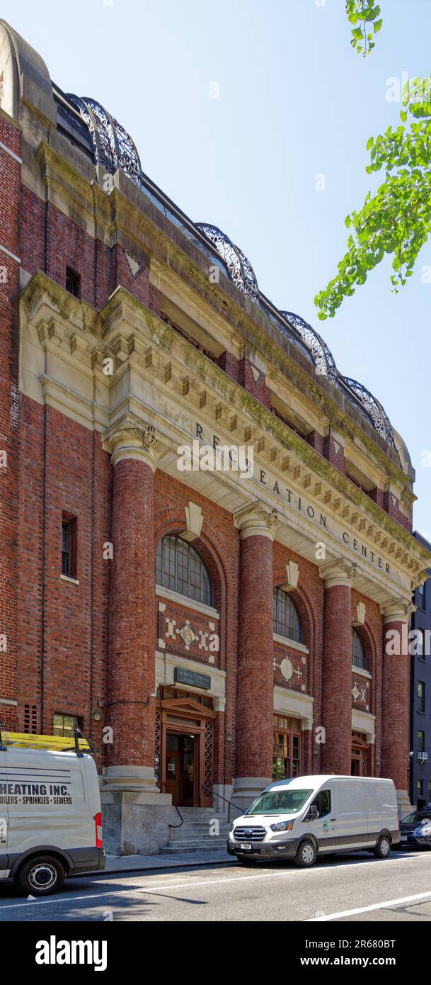 342 East 54th Street, built as a NYC public bath when many tenements lacked full bathrooms. The landmark is now a Parks Department recreation center. Stock Photo