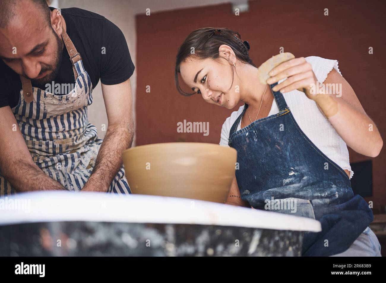 Woman man fun in pottery hi-res stock photography and images - Alamy
