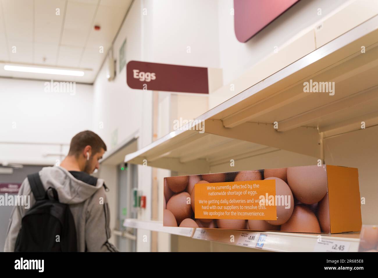 London UK. 7th June 2023. Shopper at sainsbury's looks at empty Eggs