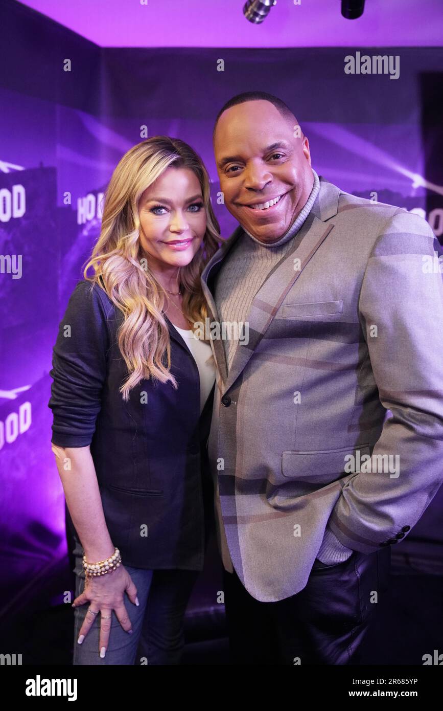 Actress Denise Richards and TV Host Tyrone Jackson on the set of Hot in Hollywood Talk Stock Photo