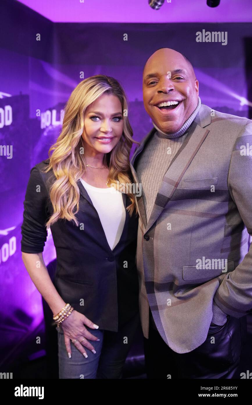 Actress Denise Richards and TV Host Tyrone Jackson on the set of Hot in Hollywood Talk Stock Photo