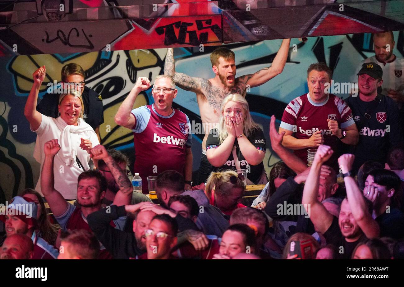 West Ham United fans celebrate full time at the Fan Zone in The Orbit