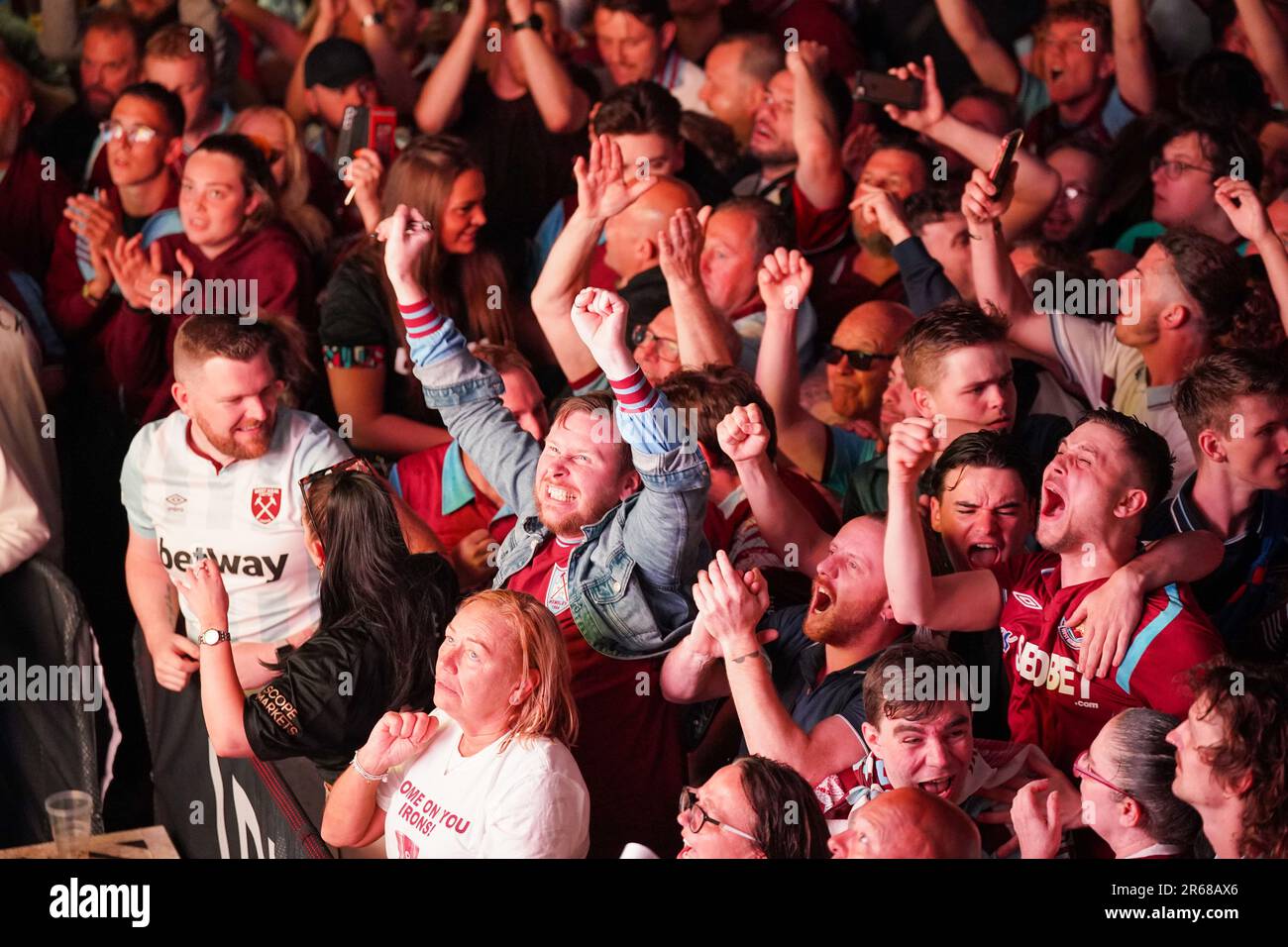 West Ham United fans celebrate full time at the Fan Zone in The Orbit