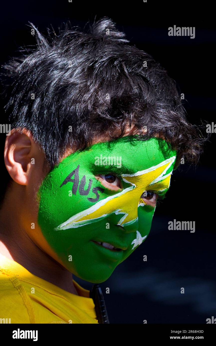 A young supporter awaits Australia's Rugby World Cup Team to arrive at