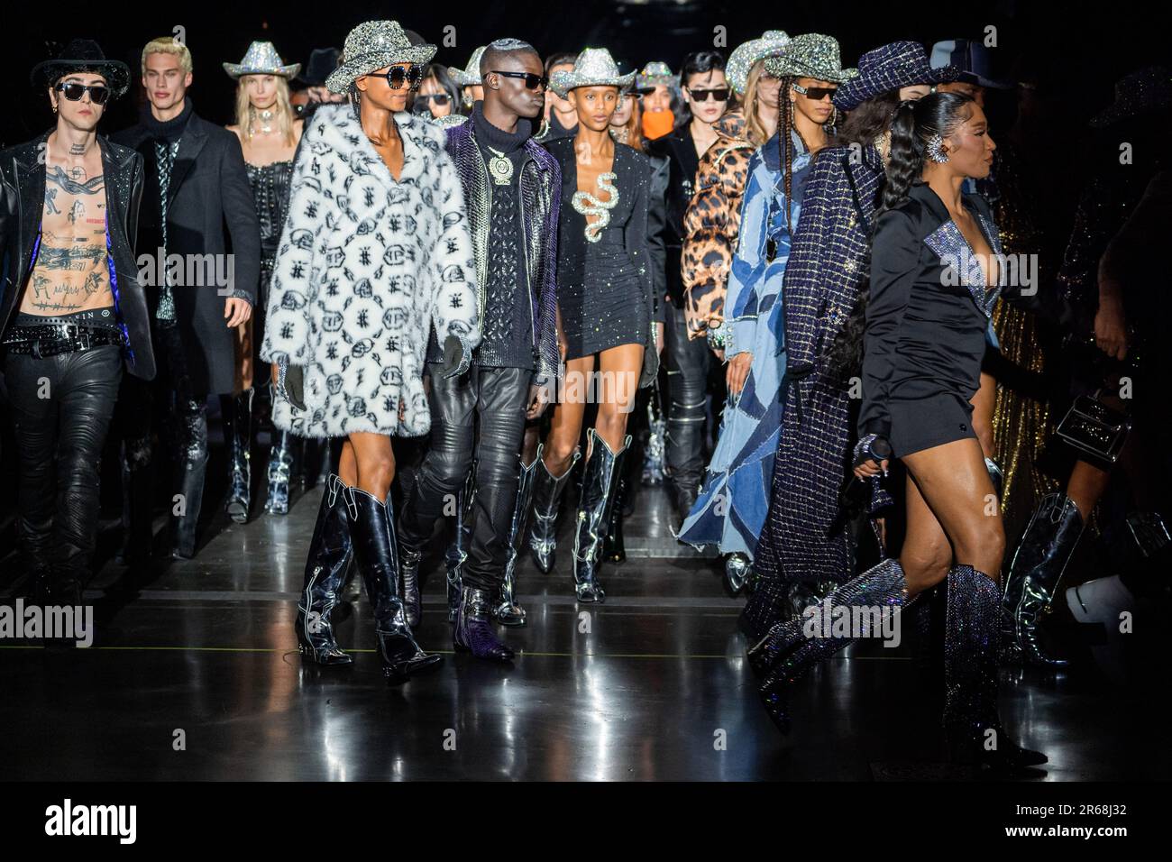 MILAN, ITALY - FEBRUARY 25: Models walk the runway finale at the Philipp Plein fashion show during the Milan Fashion Week Womenswear Fall/Winter 2023/ Stock Photo