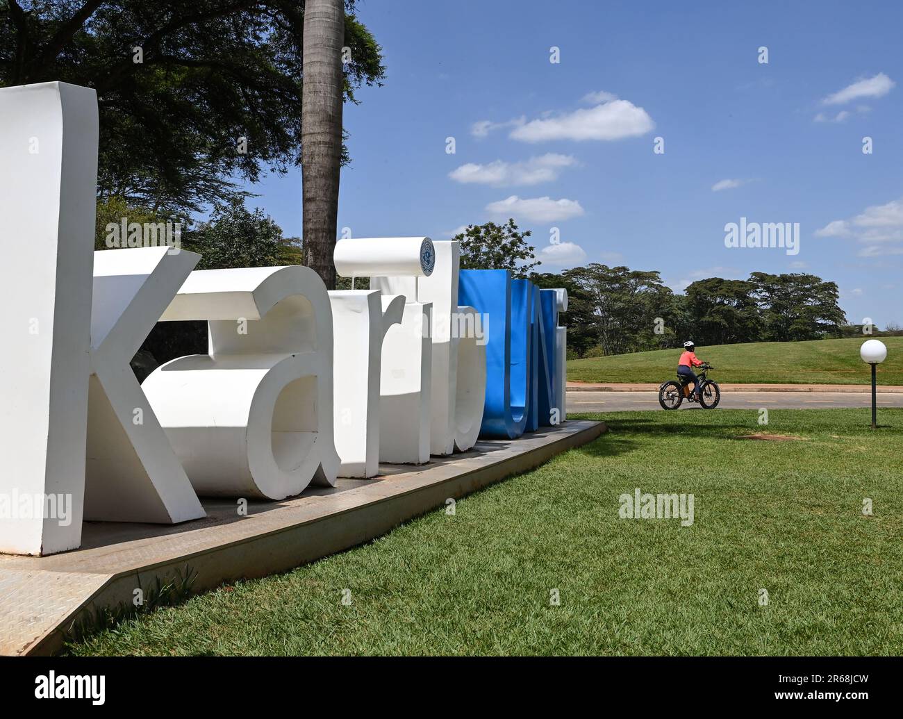Nairobi, Kenya. 7th June, 2023. A woman rides an electric bicycle
