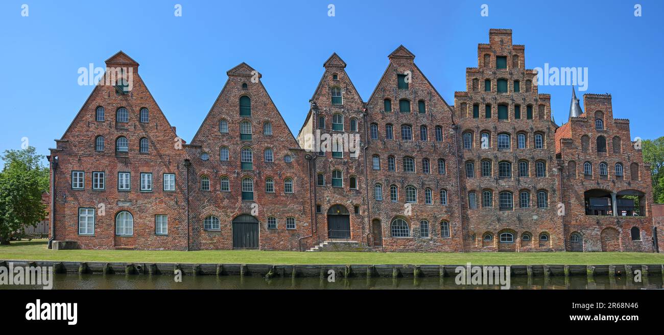 Salzspeicher of Lubeck, historic salt storage houses in red brick architecture against a blue sky, landmark and tourist destination in the old hanseat Stock Photo